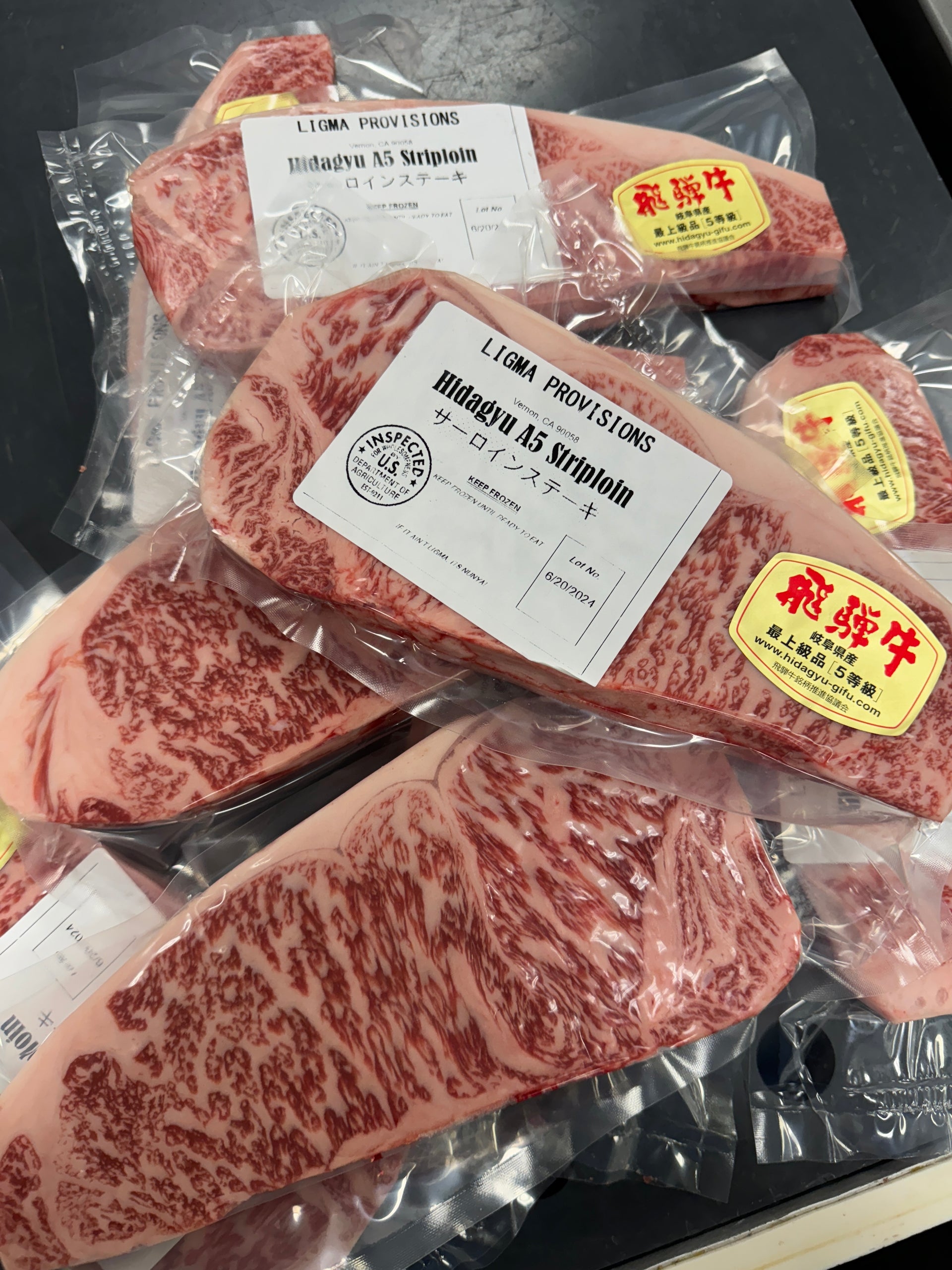 A5 Hida NY Strip — BMS 8-12 Japanese A5 Wagyu, Gifu Prefecture — cooked and sliced