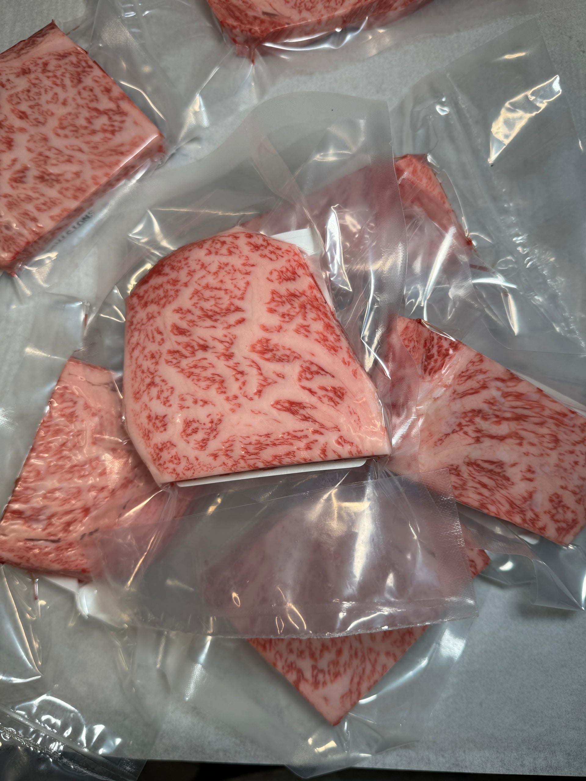 A5 Kobe Usunaga NY Strip — BMS 8-12 Japanese A5 Wagyu, Hyogo Prefecture (Kobe Beef) — marbling detail