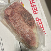 A5 Miyazaki NY Strip — BMS 8-12 Japanese A5 Wagyu, Miyazaki Prefecture — additional angle