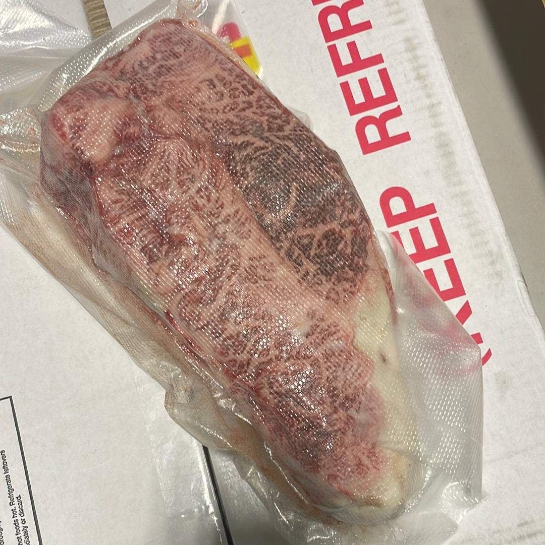A5 Miyazaki NY Strip — BMS 8-12 Japanese A5 Wagyu, Miyazaki Prefecture — additional angle