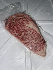 A5 Omi Emperor Ribeye — BMS 8-12 Japanese A5 Wagyu, Shiga Prefecture (Omi Beef) — cooked and sliced