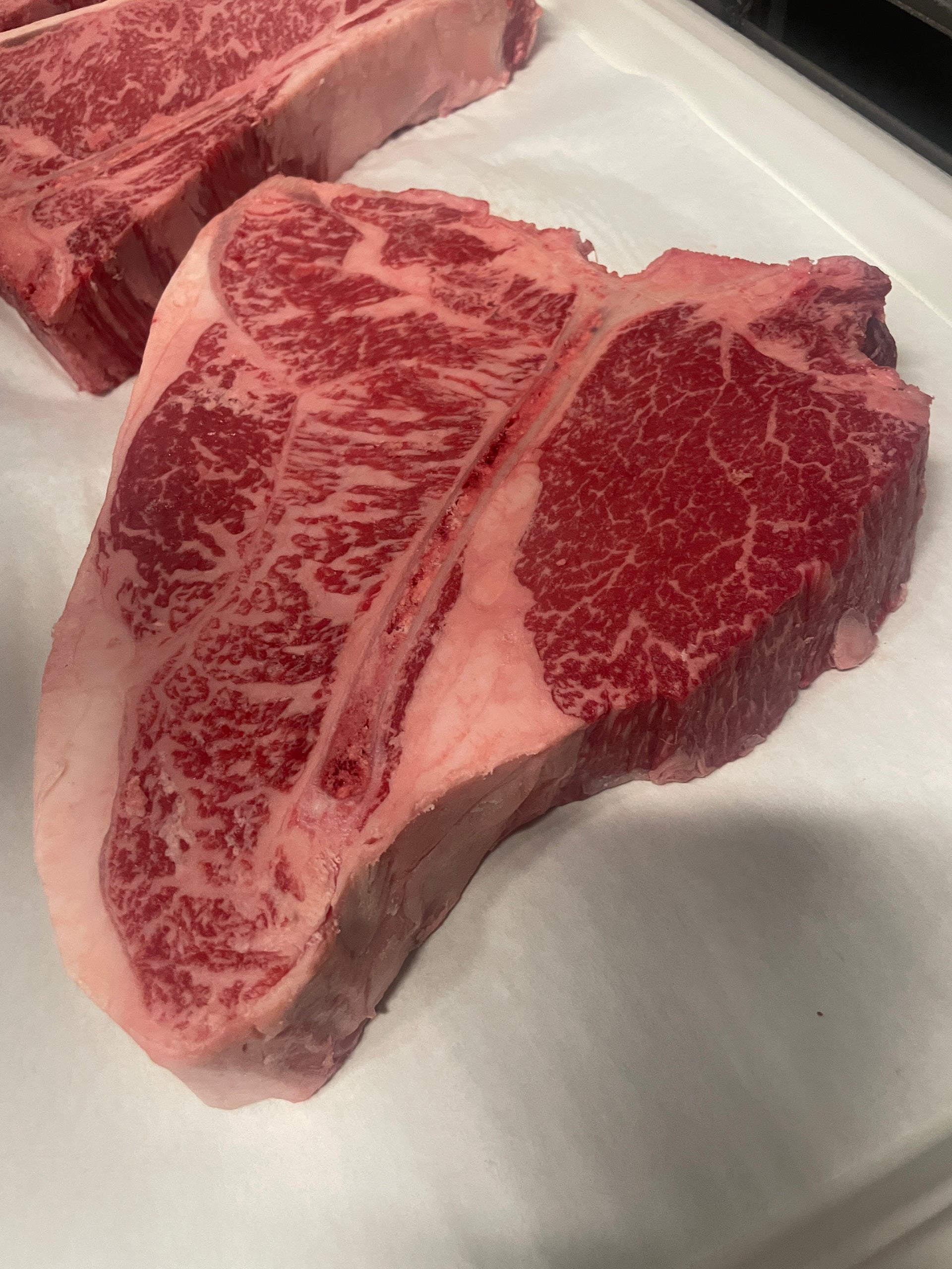 Australian Wagyu Porterhouse Blue — BMS 4/5 Australian Wagyu Blue Label — marbling detail