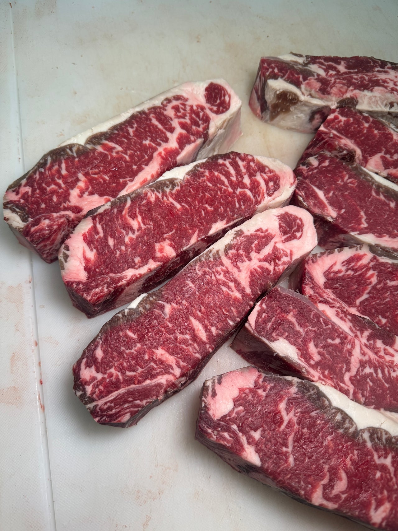 USDA Prime NY Strip - 60 Day Dry Aged — USDA Prime grade beef