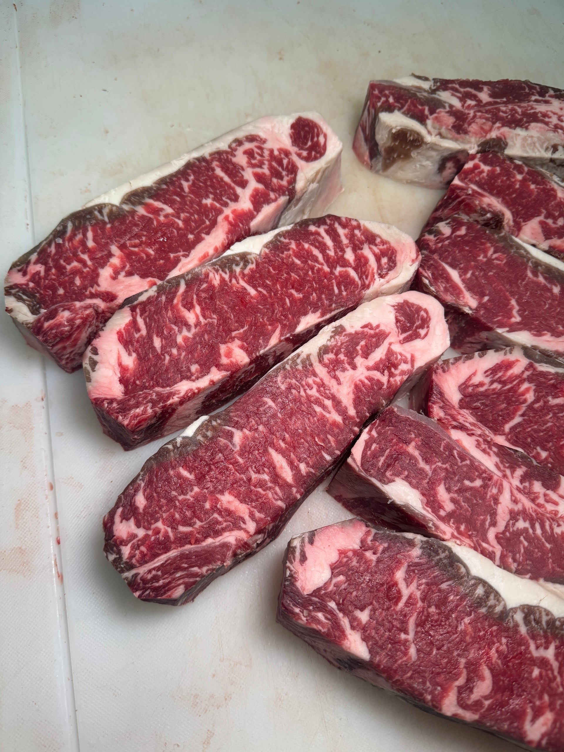 USDA Prime NY Strip - 60 Day Dry Aged — USDA Prime grade beef