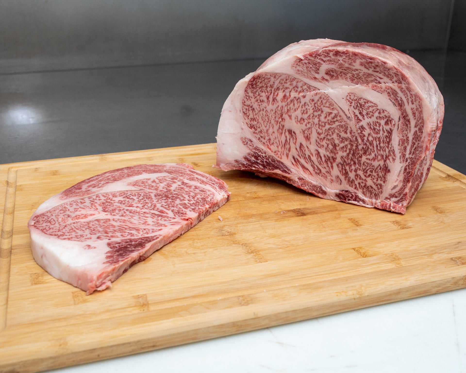 A5 Hokkaido Ribeye — BMS 8-12 Japanese A5 Wagyu, Hokkaido — close-up texture