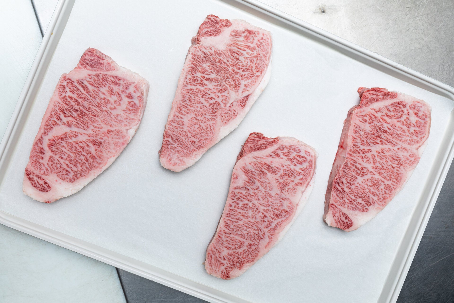 A5 Miyazaki NY Strip — BMS 8-12 Japanese A5 Wagyu, Miyazaki Prefecture — marbling detail