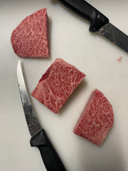A5 Miyazaki NY Strip — BMS 8-12 Japanese A5 Wagyu, Miyazaki Prefecture — close-up texture