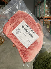 A5 Miyazaki Ribeye — BMS 8-12 Japanese A5 Wagyu, Miyazaki Prefecture — close-up texture