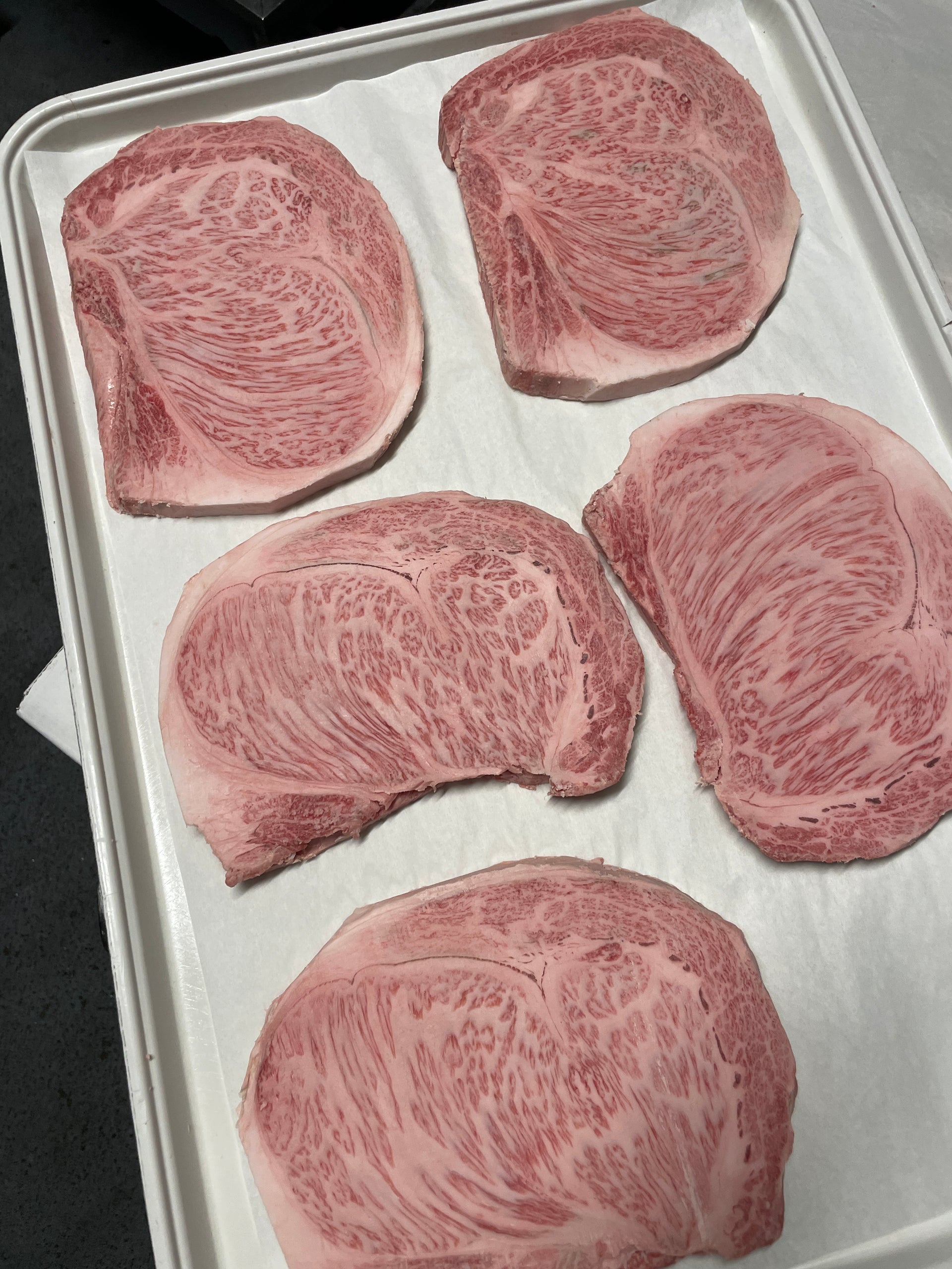 A5 Takamori Sake-Fed Ribeye — BMS 8-12 Japanese A5 Wagyu, Yamaguchi Prefecture — cooked and sliced