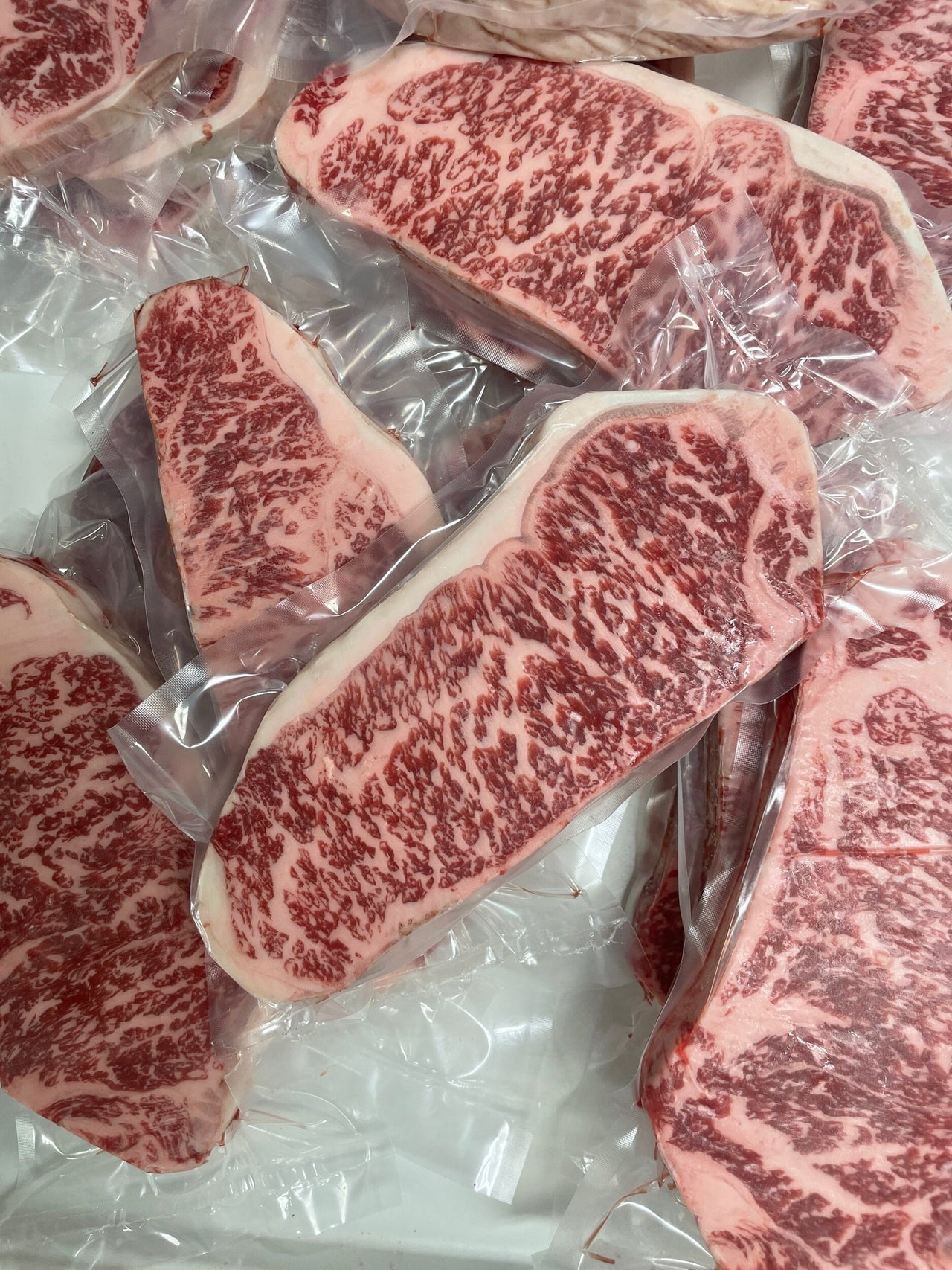 Australian Wagyu NY Strip Gold — BMS 8/9 Australian Wagyu Gold Label — marbling detail