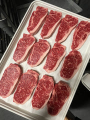 Australian Wagyu NY Strip Silver — BMS 6/7 Australian Wagyu Silver Label — cooked and sliced