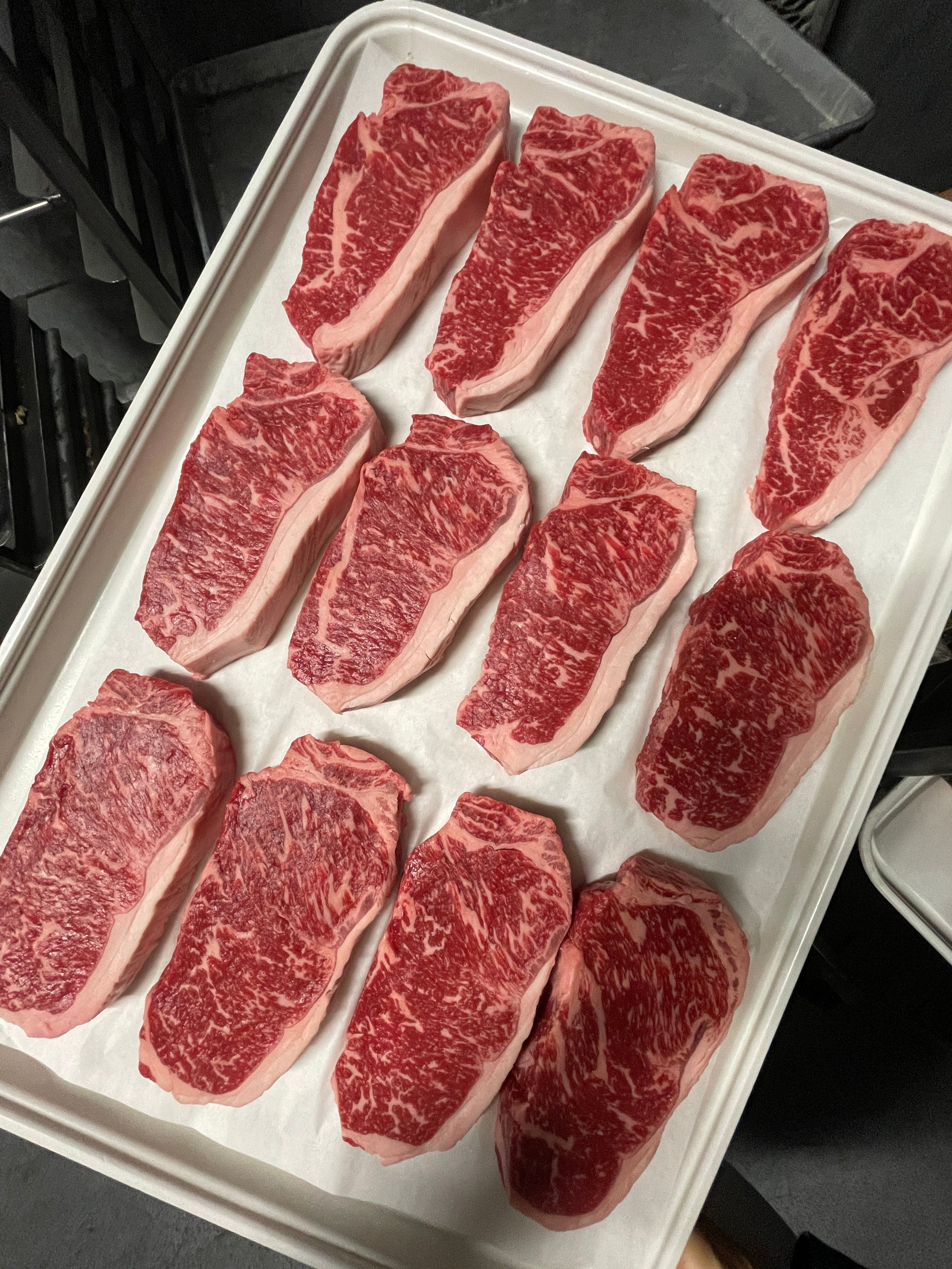 Australian Wagyu NY Strip Silver — BMS 6/7 Australian Wagyu Silver Label — cooked and sliced
